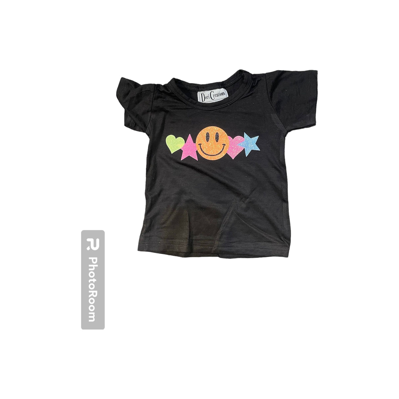 infant smile across t-shirt